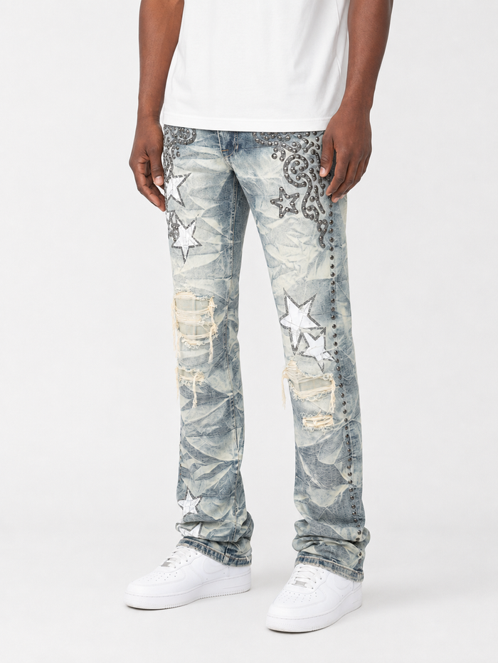 Blue Smoke Rise Studded R&R Stacked denim jeans with studded details and a relaxed fit, showcased in this image.