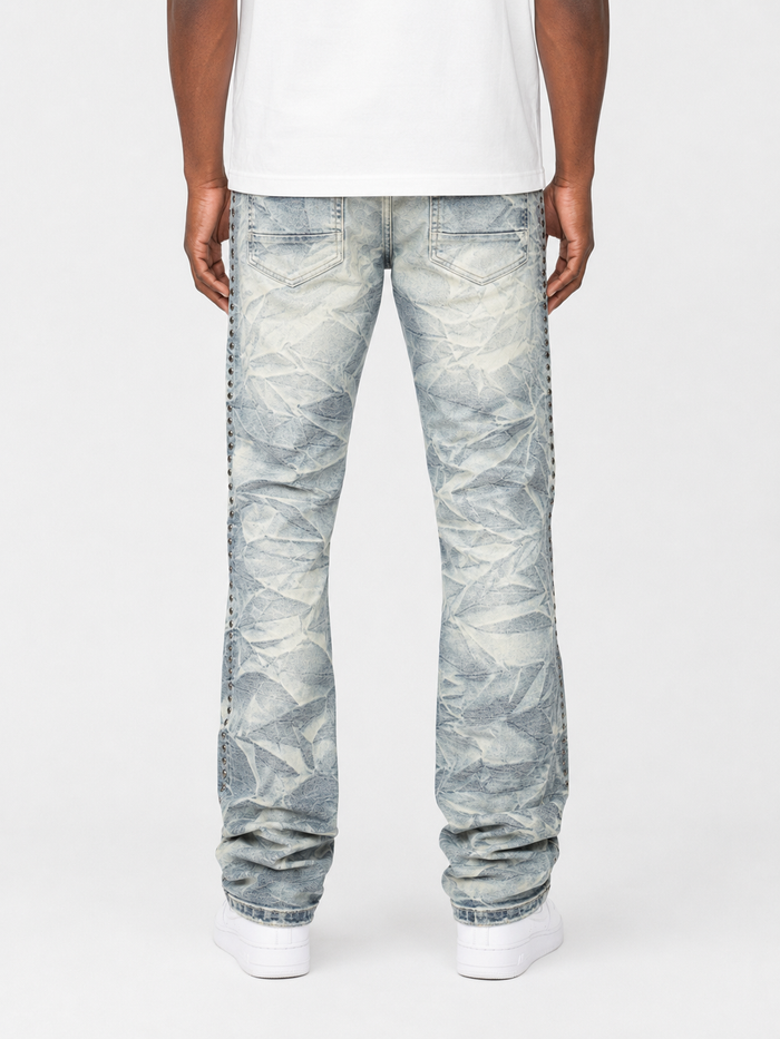 Blue Smoke Rise Studded R&R Stacked Denim jeans with studded details and a stacked design, displayed on a neutral background.