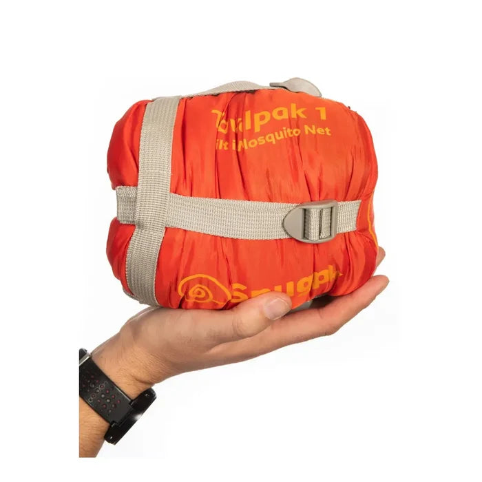 Studio shot on a white background of Snugpak Travelpak 2 season sleeping bag packed in its stuff sack in held in the palm of a hand