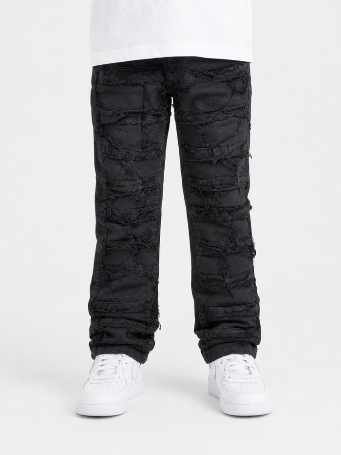 Spark Kids Rip & Repair Stack Denim in Jet Black, stylish kids' denim jeans with distressed details and repair patches.