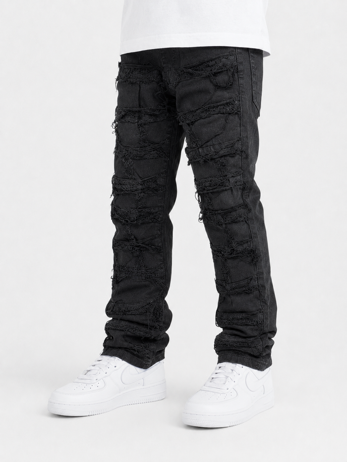 Spark Kids Rip & Repair Stack Denim in Jet Black, stylish kids' denim jeans with distressed details and a comfortable fit.