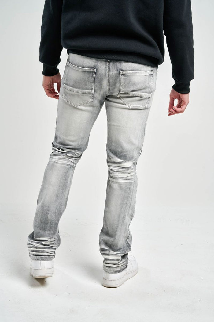 Gray Spark Slim Straight Stretch Denim jeans, showcasing the fit and fabric texture, designed for a sleek, modern look.