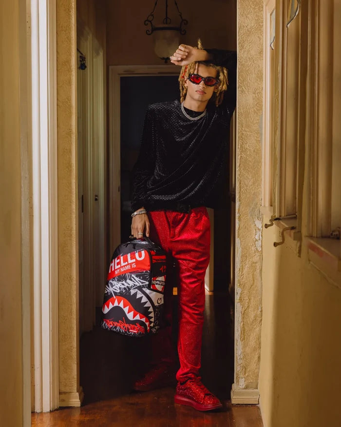 Sprayground Archive Legacy 16th Edition backpack with bold graphic design and multiple compartments, accessory for stylish storage.