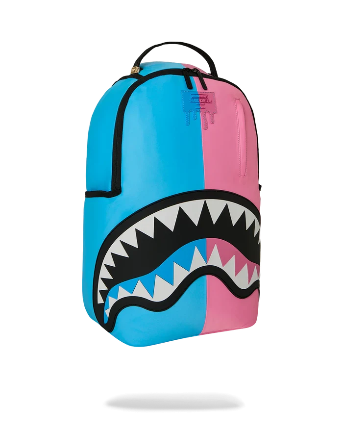 Sprayground Candy Clash Shark Central backpack featuring colorful shark and candy designs, with adjustable straps and front zip pocket.