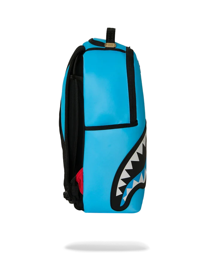Sprayground Candy Clash Shark Central backpack with colorful shark graphic, durable straps, and spacious compartments.
