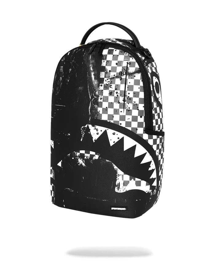 Sprayground Canvas Chaos backpack featuring bold graffiti-style design and multiple compartments for accessories.