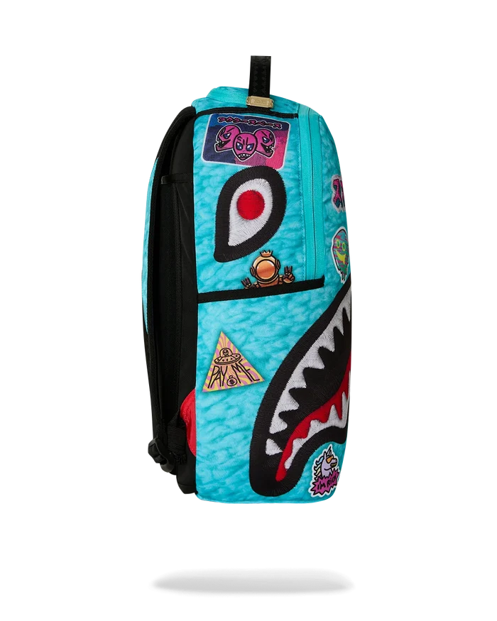 Sprayground Lucky Pack backpack with bold graphics, multiple compartments, and adjustable straps, designed for stylish accessories.