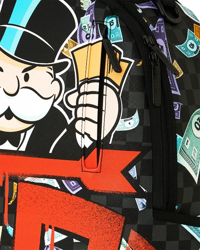 Sprayground Monopoly Time To Go backpack with bold graphic design and adjustable straps, stylish accessories for everyday use.
