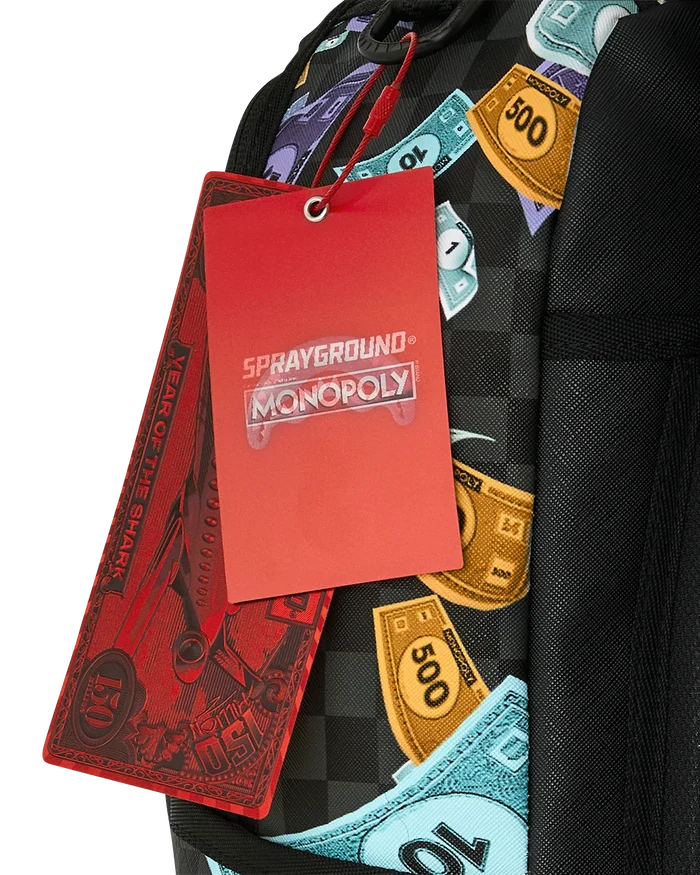 Sprayground Monopoly Time To Go backpack with bold graphic design and multiple compartments, durable accessories for everyday use.
