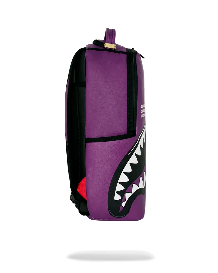 Sprayground Shark Central Bubble Shark Purple backpack with colorful shark design, durable straps, and accessory details.