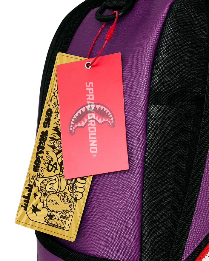 Sprayground Shark Central Bubble Shark purple backpack with bold shark graphic, functional accessories, and adjustable straps.