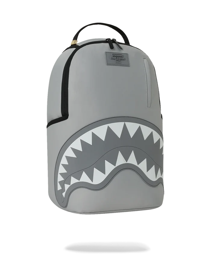Sprayground Shark Central Passport 2.0 Haze backpack with shark graphic, adjustable straps, and spacious main compartment.