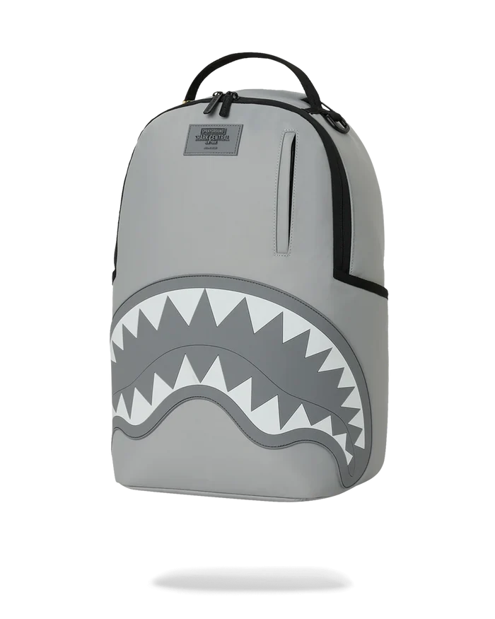 Sprayground Shark Central Passport 2.0 Haze backpack with shark graphic, adjustable straps, and multiple compartments.