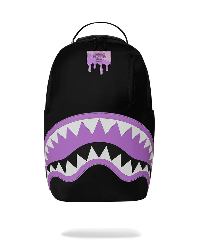Sprayground Shark Central Passport backpack with shark graphic, adjustable straps, and multiple compartments for accessories.