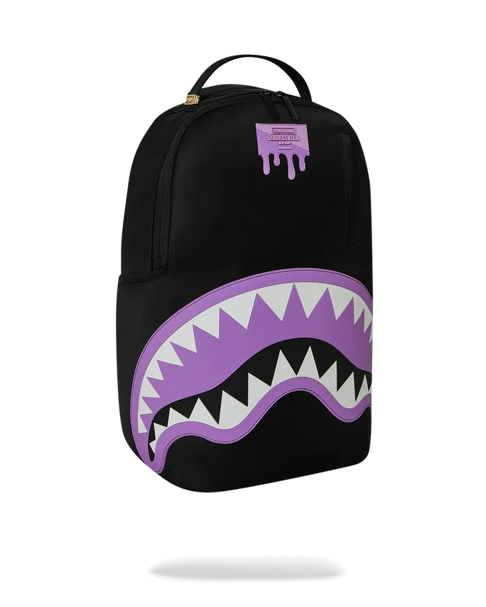 Sprayground Shark Central Passport backpack with shark graphic, durable straps, and spacious main compartment for accessories.