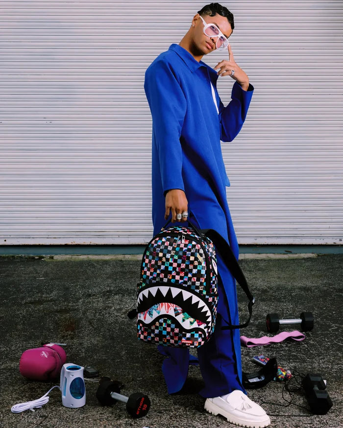 Sprayground Sharkverse Universe backpack with vibrant shark and cosmic design, adjustable straps, and multiple compartments.