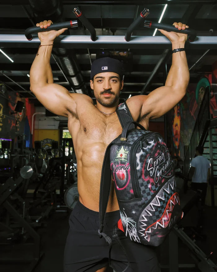 Sprayground Spray Session backpack with bold graffiti-style design, durable straps, and multiple compartments for accessories.