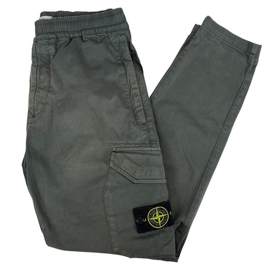 Stone Island grey cargo trousers with logo patch and pockets, visible discolouration.