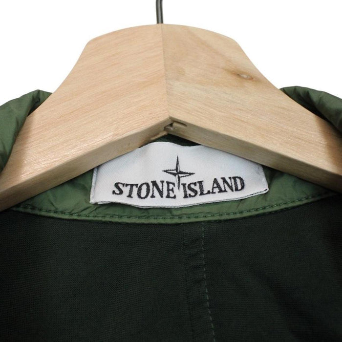 Stone Island green nylon overshirt jacket with full zip and compass logo patch.