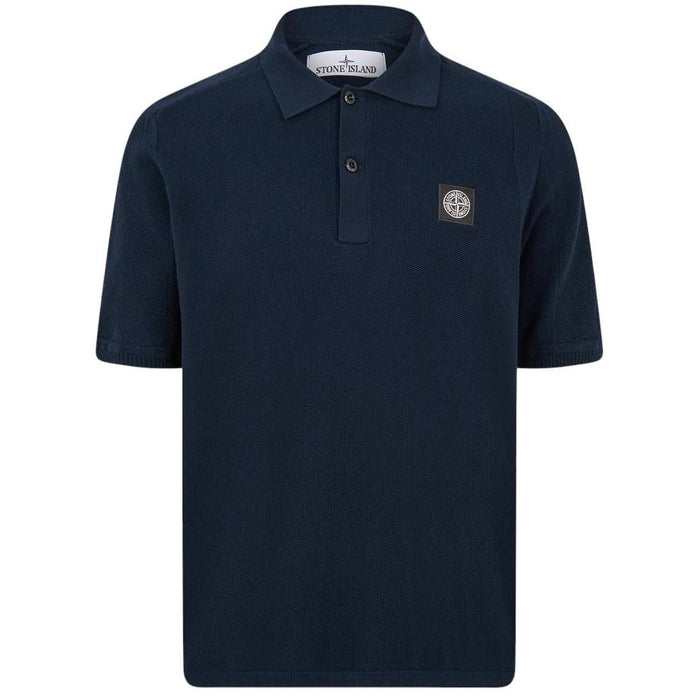 Stone Island navy blue polo shirt with Compass patch and three-button placket.