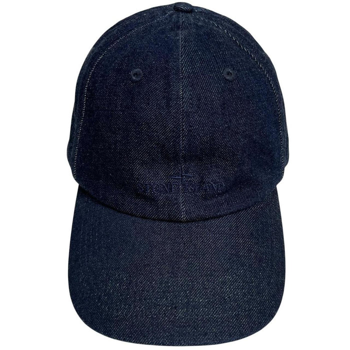 Stone Island blue denim baseball cap with diagonal twill texture and logo patch.