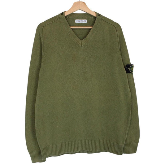 Stone Island green v-neck cotton knit jumper with logo patch and visible wear.