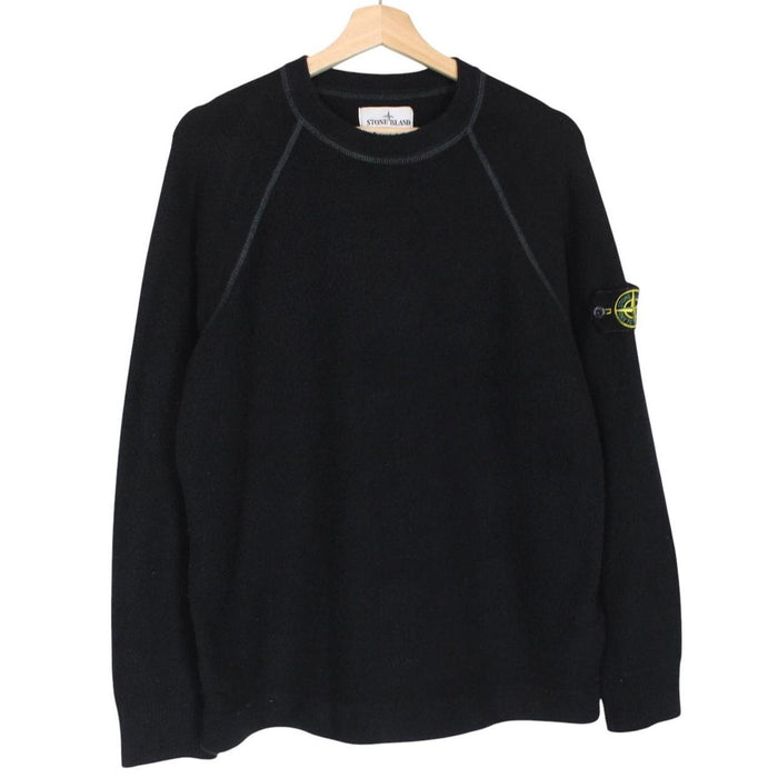 Stone Island black knit jumper with logo badge and cotton/nylon blend material.