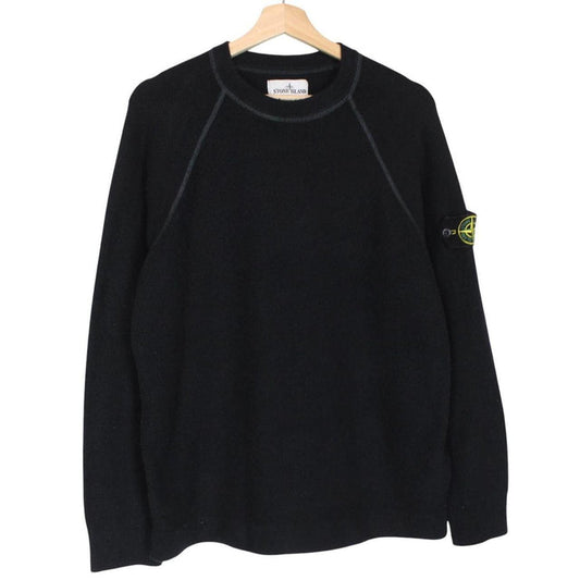 Stone Island black knit jumper with logo badge and cotton/nylon blend material.