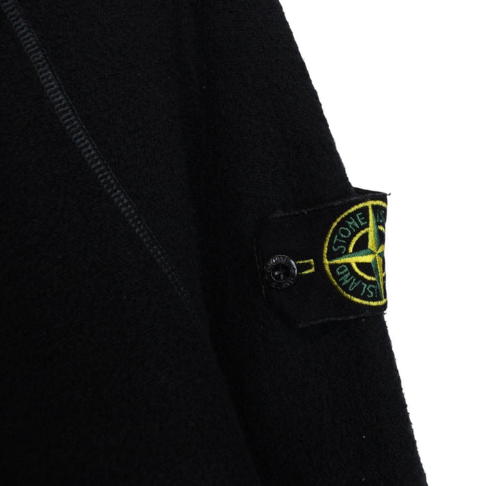 Stone Island black knit jumper with logo badge and cotton/nylon blend material.
