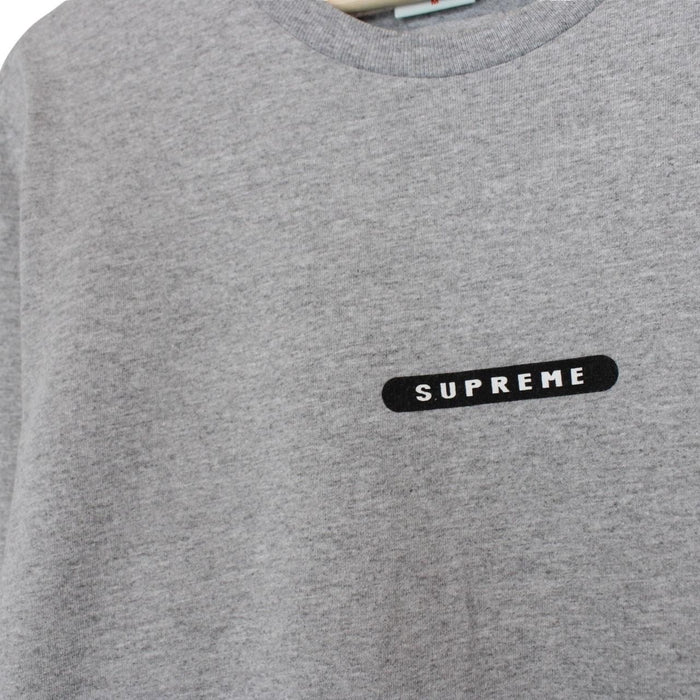 Supreme grey and pink long sleeve cotton t-shirt with wild print and pocket detail.