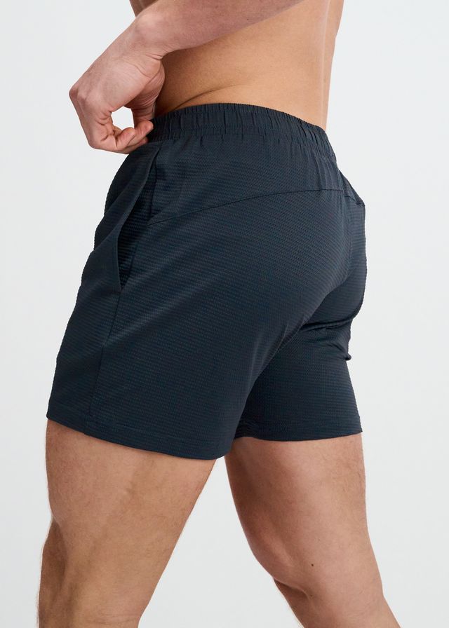 TEXTURED MESH STRETCH PERFORMANCE SHORTS