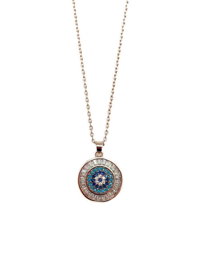 Necklace with a circular pendant featuring a blue and white design on a white background