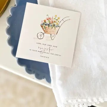 Illustrated Psalms scripture card featuring a watercolor wheelbarrow filled with flowers and Psalm 8:1.