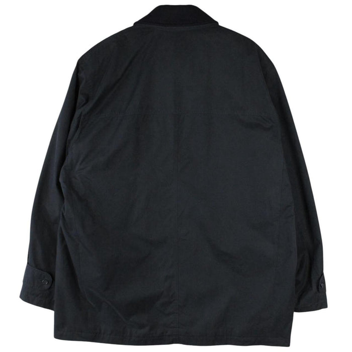 Burberry navy blue wool coat with Nova Check lining and logo detail.