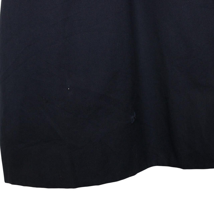 Burberry navy blue trench coat featuring classic Nova Check pattern and single-breasted design.