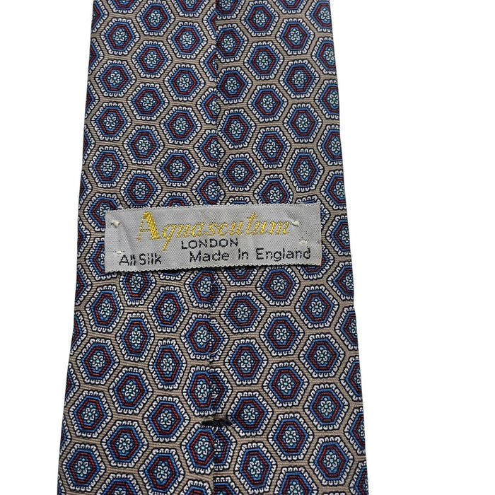Aquascutum blue and grey silk tie with geometric print pattern.