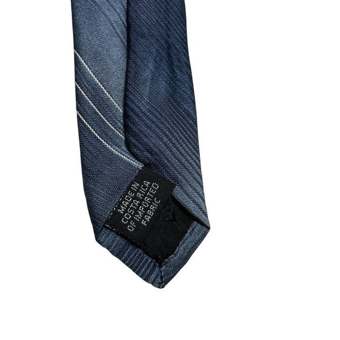 DKNY blue striped silk tie with elegant sheen and classic pattern.