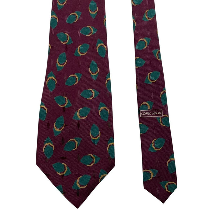 Giorgio Armani burgundy silk tie with geometric print and logo detail.
