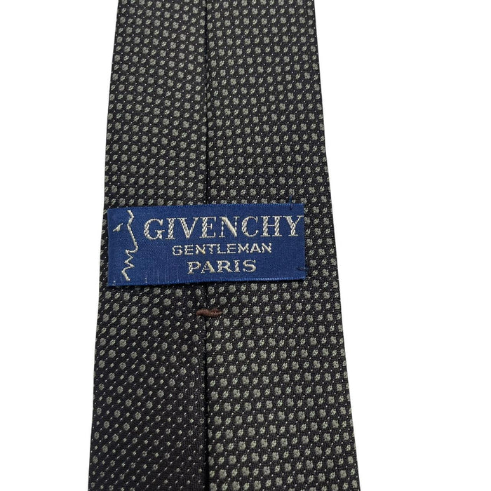 Givenchy grey polyester tie featuring a classic design and excellent condition.
