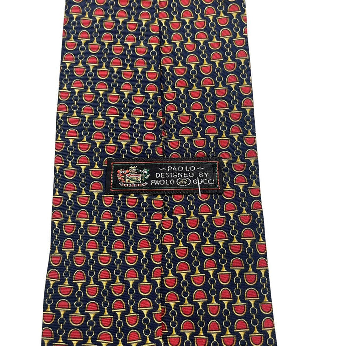 Gucci silk tie red and navy blue horsebit pattern with logo detail.