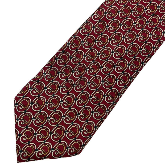 Gucci burgundy silk tie with vintage pattern and signature logo detail.
