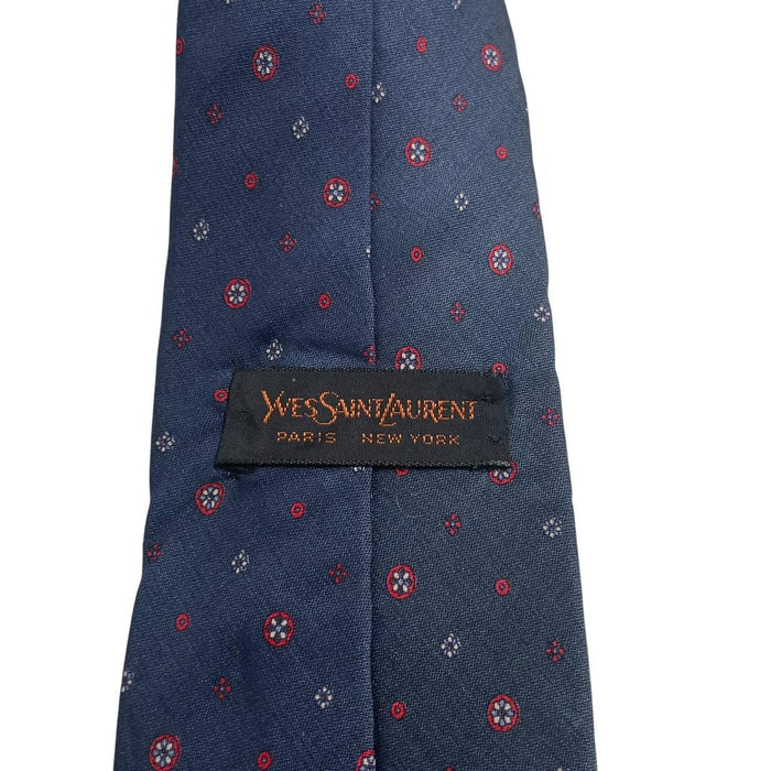 Yves Saint Laurent navy blue silk tie with subtle sheen and classic design.
