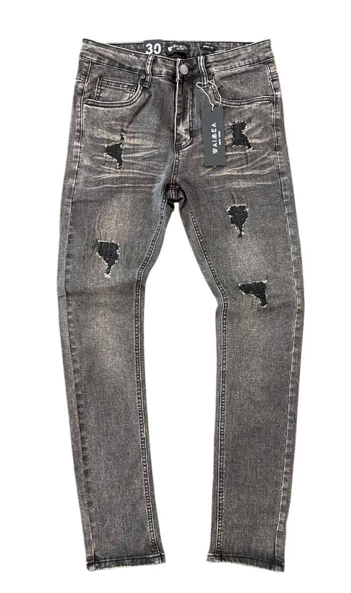 Black wash Waimea Rip Skinny Denim jeans, showing close-up of distressed fabric and slim fit design.