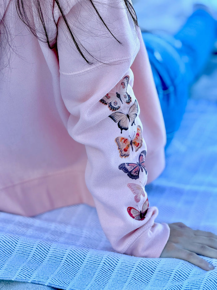 close up watercolor butterfly hoodie pink and red sleeve design