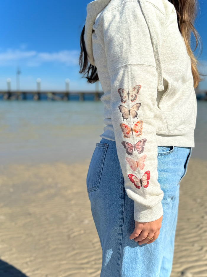 Close up of butterfly in red pink designs