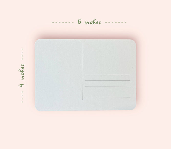Light blue postcard with dimensions labeled on a pink background