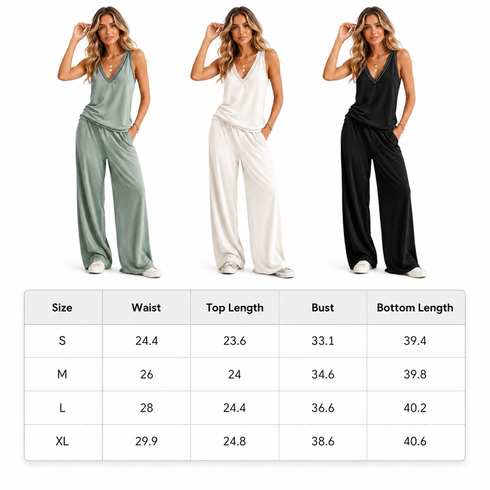 Three women wearing jumpsuits with a size chart below on a white background