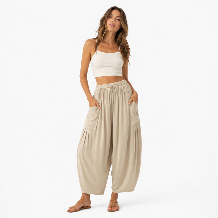 Wide leg pants women styled with elastic waist and pleated front detail