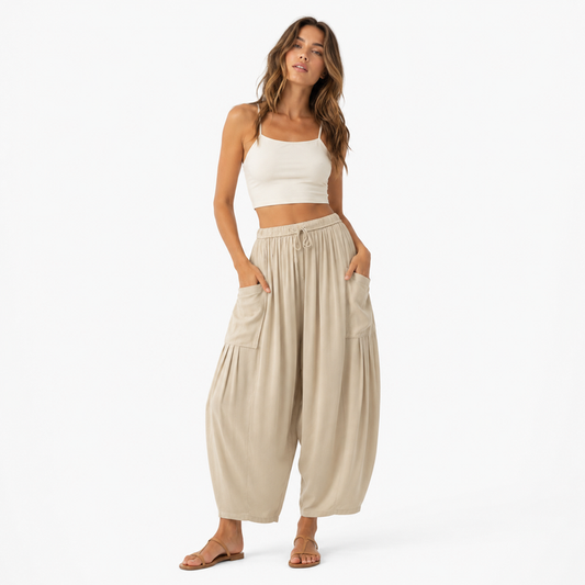 Wide leg pants women styled with elastic waist and pleated front detail