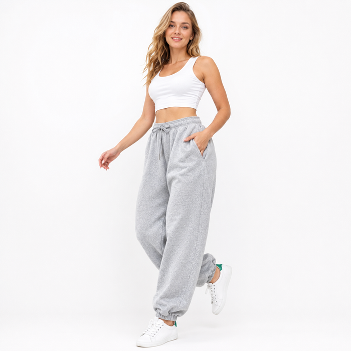 Women's loose fit drawstring joggers with pockets in a rayon polyester spandex blend for relaxed everyday outfits and errands